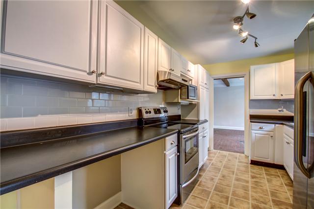 4127 Sneed Road Nashville, TN 37215 - Photo 8 of 30 Counter offers eating area or good work space , has subway tile backsplash