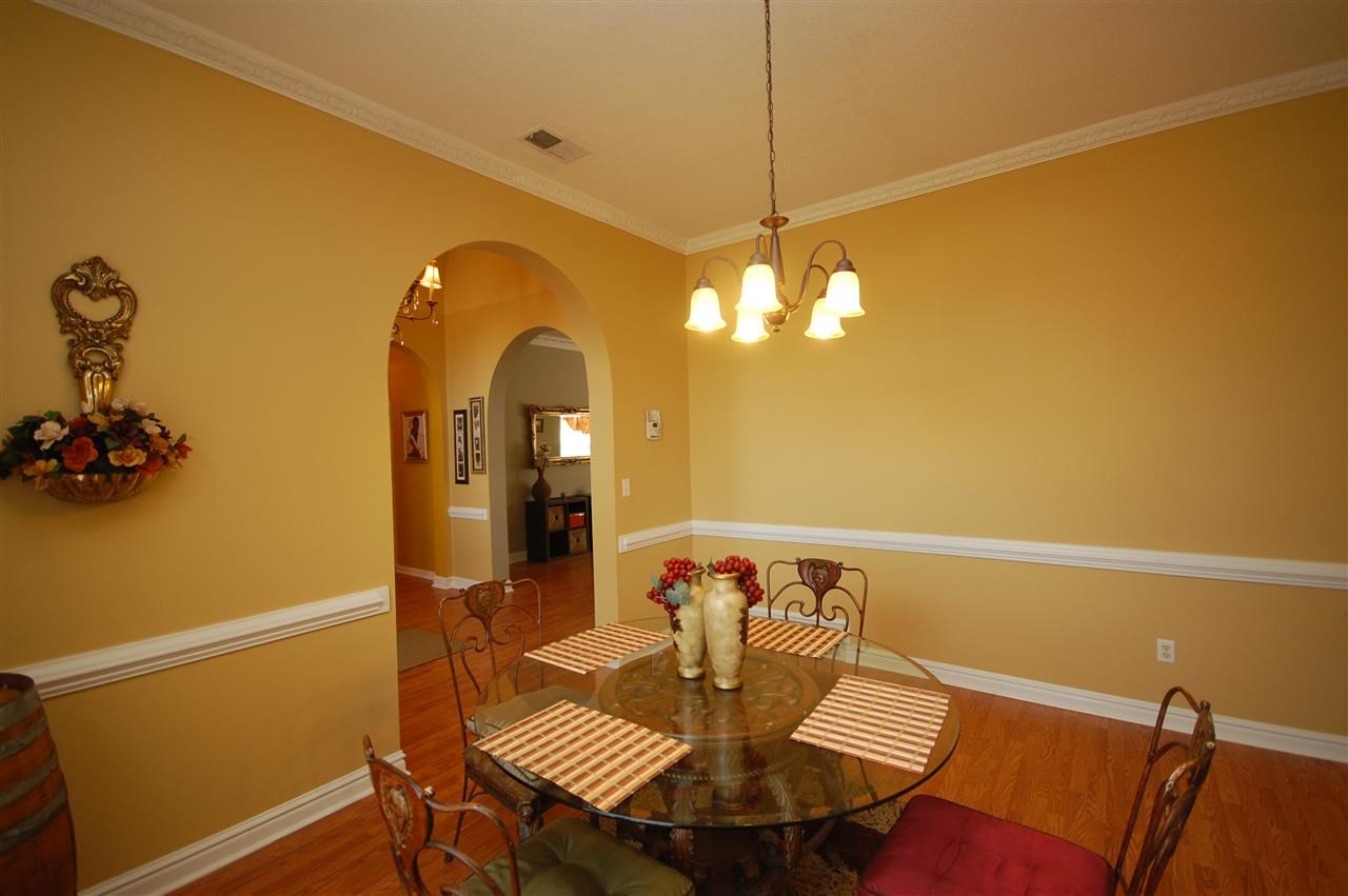 6407 Needle Ridge Road Bartlett, TN 38135 - Photo 4 of 25 The dining room has captivating light fixture!