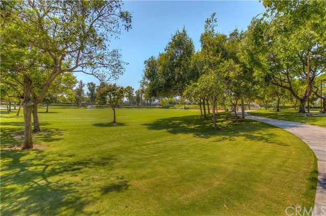 131 Remington, Unit 239 Irvine, CA 92620 - Photo 33 of 36 Take a stroll or enjoy a run on the paths in Irvine's Orchard Park!