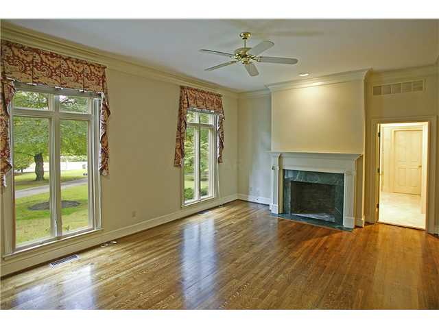 175 Waring Road Memphis, TN 38117 - Photo 9 of 12 Master bedroom with handsome fireplace for cozy winters.