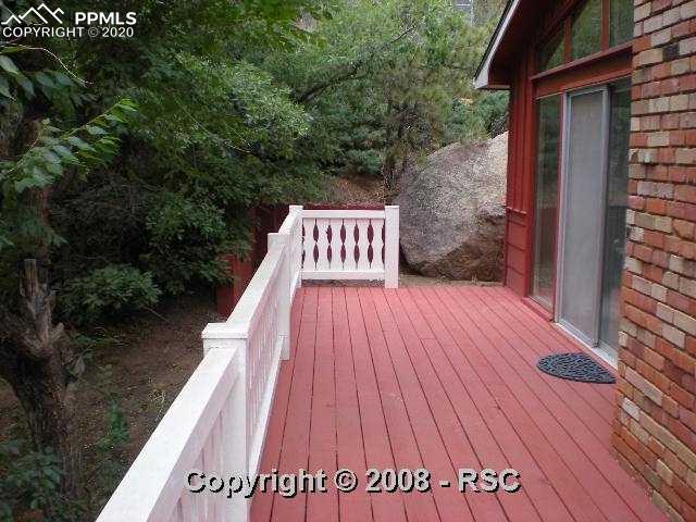 7930 Topeka Avenue Cascade, CO 80809 - Photo 7 of 10 Wrap around decking to enjoy the lovely views
