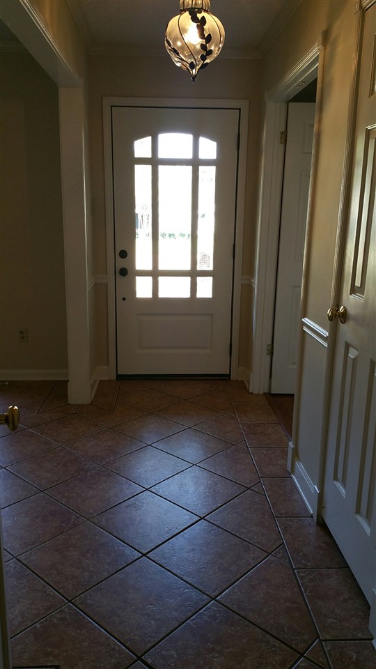 301 West White Road Collierville, TN 38017 - Photo 3 of 19 Beautiful entry with tile floor, light colors, and front door with 3/4 light!