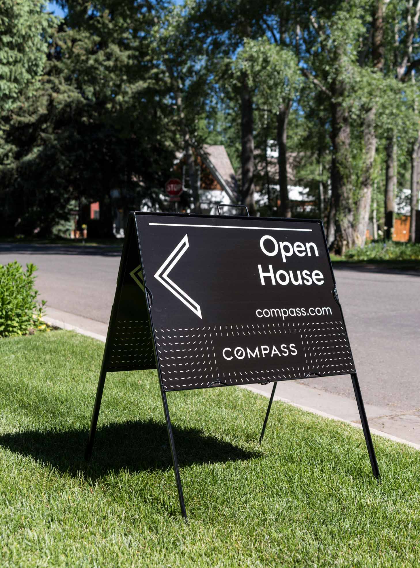 Open House sign with Compass' unique branding